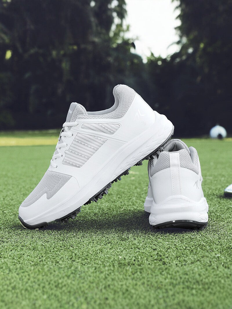 Mens golf shoe spikeless outsole with a molded rubber nub pattern for grip