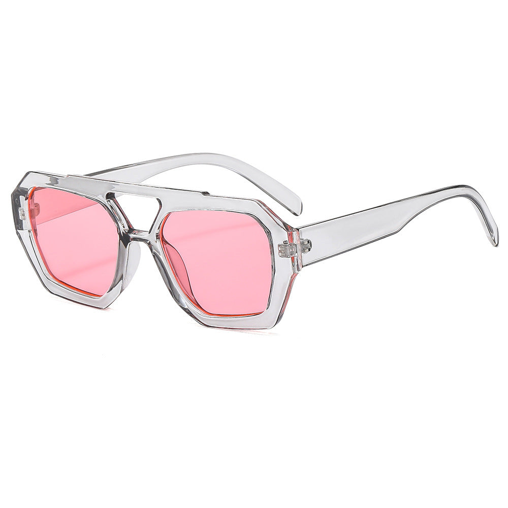 Retro polygonal sunglasses photographed in a modern interior setting