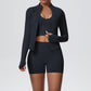 Black seamless yoga set showing the stand collar zip jacket, cropped tank and matching shorts