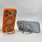 Orange and frosted clear phone cases side by side, each standing on its folded-out ring stand