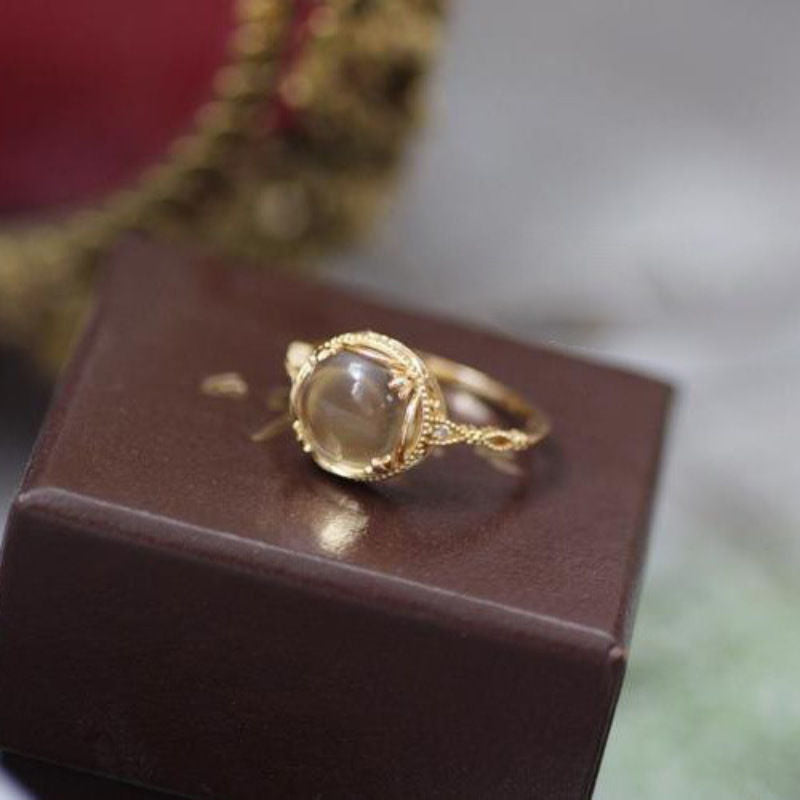 Angled hero shot of the geometric open silver-tone adjustable ring