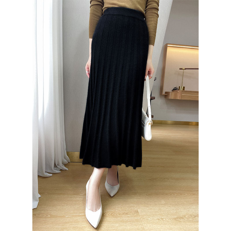 Back view of the high waist ribbed wool pleated midi skirt