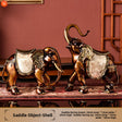 A pair of shell saddle elephants