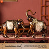 A pair of shell saddle elephants