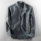 Side profile of the stand collar linen shirt showing the long sleeve and relaxed body
