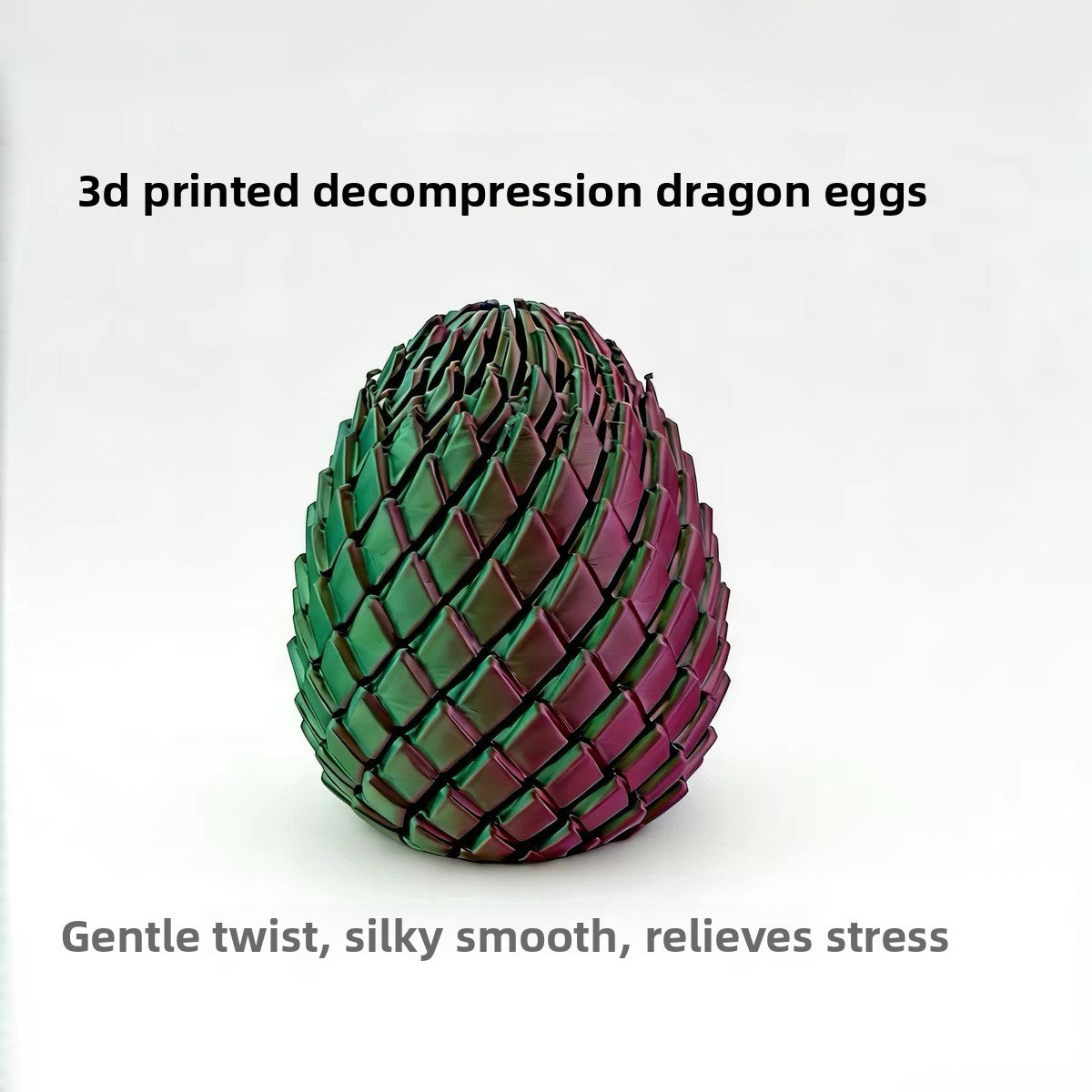 Three color 3D printed dragon egg fidget toy with a scaled metallic finish