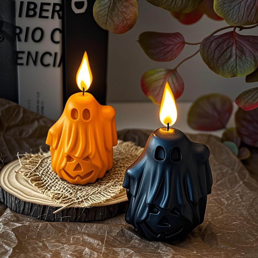 Black ghost shaped candle on a small dish for Halloween decor