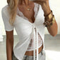 Sheer floral lace front panel below the tie