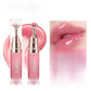 Two OLIBOLLA lip glaze tubes with metal tips beside a pink glossy lip close up