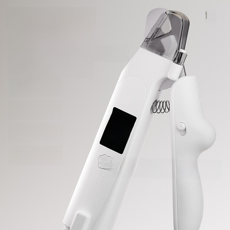 Closeup of white pet nail clipper head with clear guard, LED window and coil spring