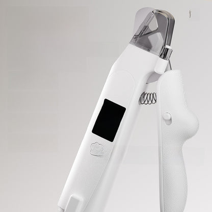 Closeup of white pet nail clipper head with clear guard, LED window and coil spring