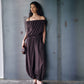 Loose balloon leg pants with flat side pockets and a light crinkled fabric