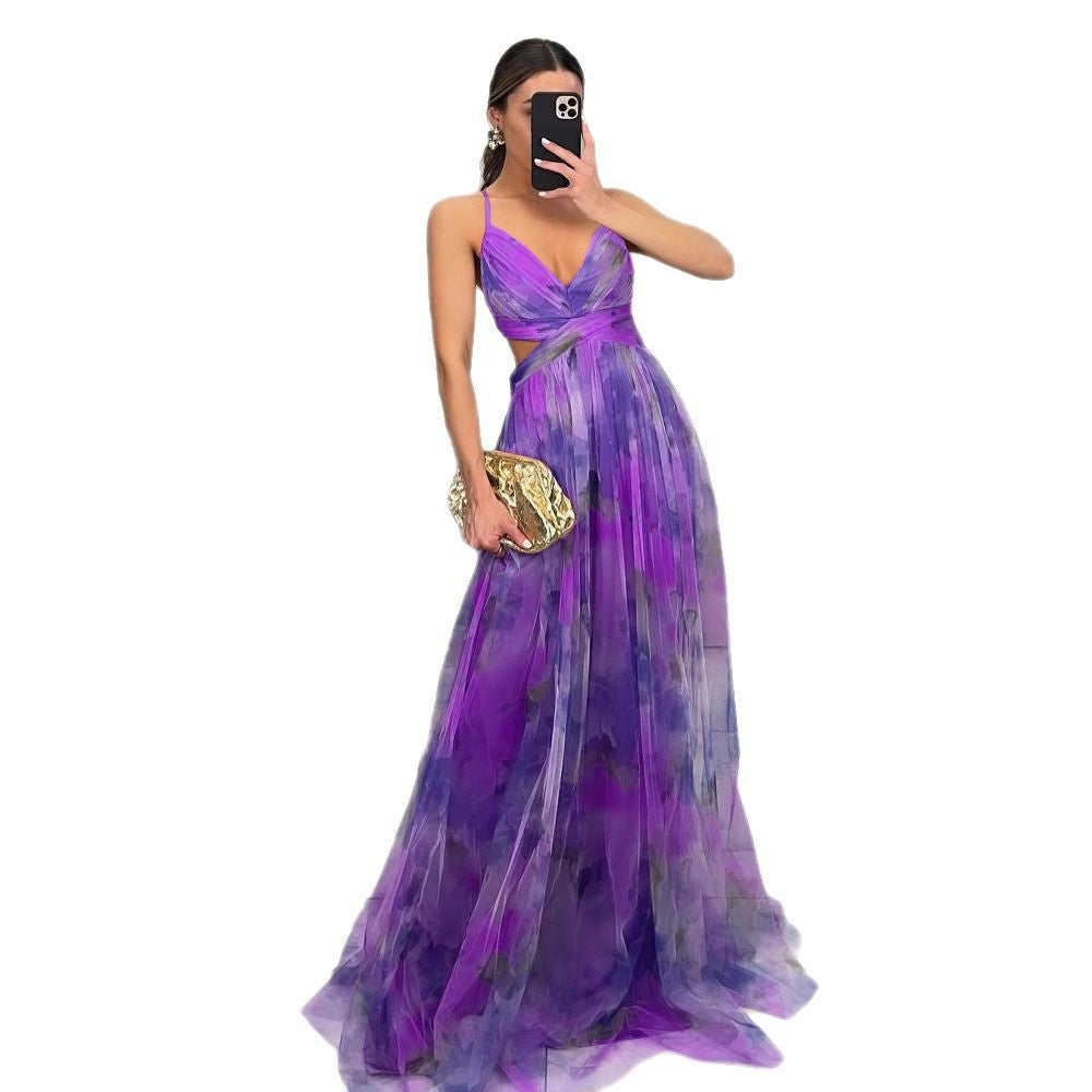 Close-up of the printed mesh fabric texture on the sling maxi dress