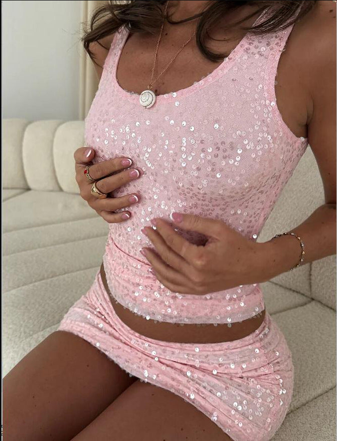 Allover sequin tank and mini skirt set shown on a plain background