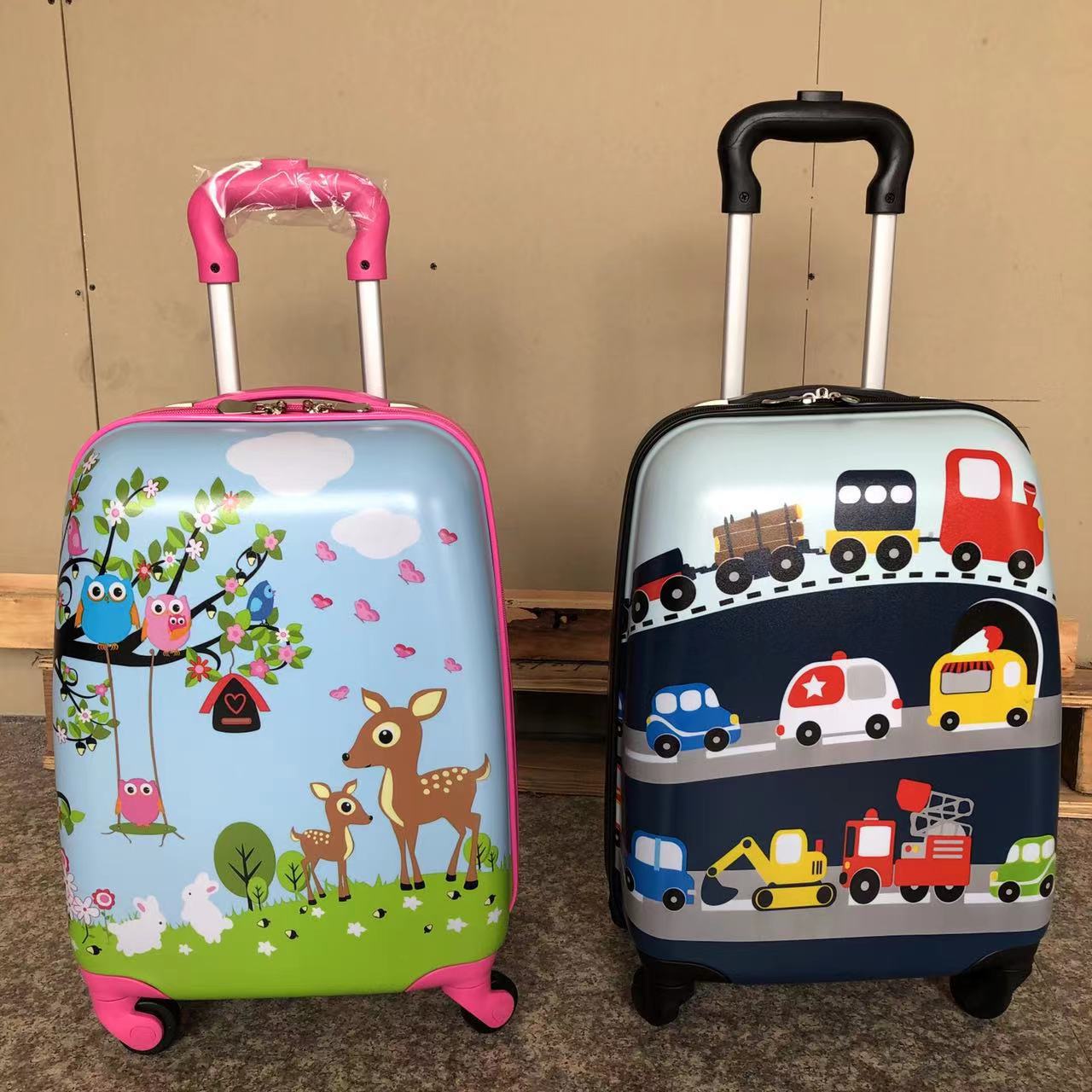 Kids cartoon trolley suitcase and backpack seen from above with pull handles extended