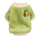 Green plush pet pullover with an embroidered avocado patch and a cream ribbed collar on a white background