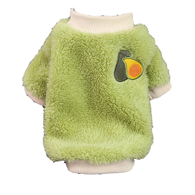 Green plush pet pullover with an embroidered avocado patch and a cream ribbed collar on a white background