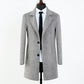 Reverse view product shot of the men's herringbone wool blend overcoat and back vent