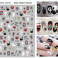 Halloween nail decals shown as a finished manicure with skulls and pumpkins