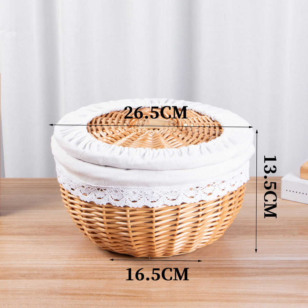 Small round wicker basket with fabric lid showing 26.5 cm top width, 13.5 cm height and 16.5 cm base measurements