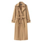 Double breasted belted longline woollen look overcoat, the self tie belt knotted at the front