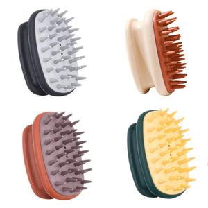 Four color range of elliptical silicone scalp shampoo brushes on a plain background