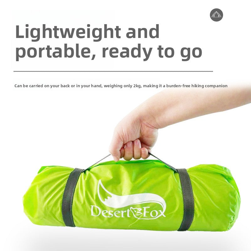 Double layer camping tent set up showing the inner mesh canopy and outer fly