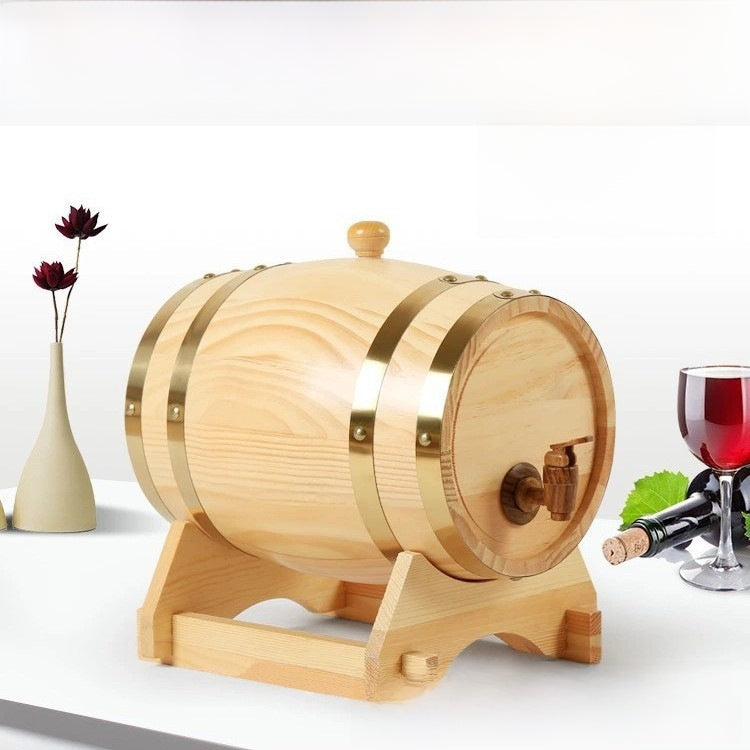 Pale natural wood barrel drink dispenser with a front spigot on a matching stand