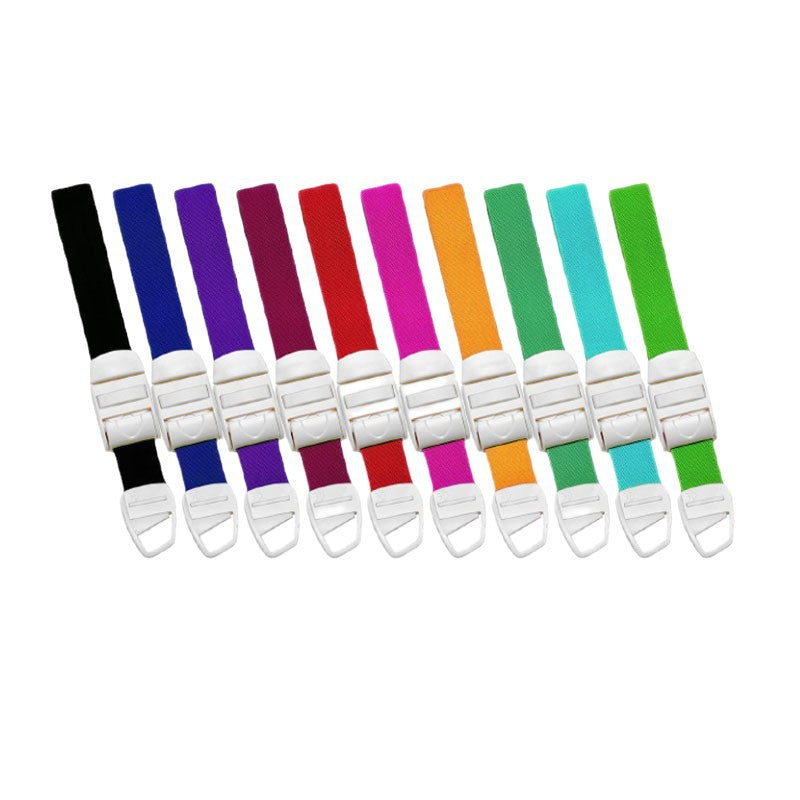 A row of quick release tourniquet bands laid out in many colours with white plastic snap buckles
