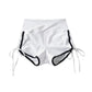 High waist contrast trim shorts in a modern interior styled scene