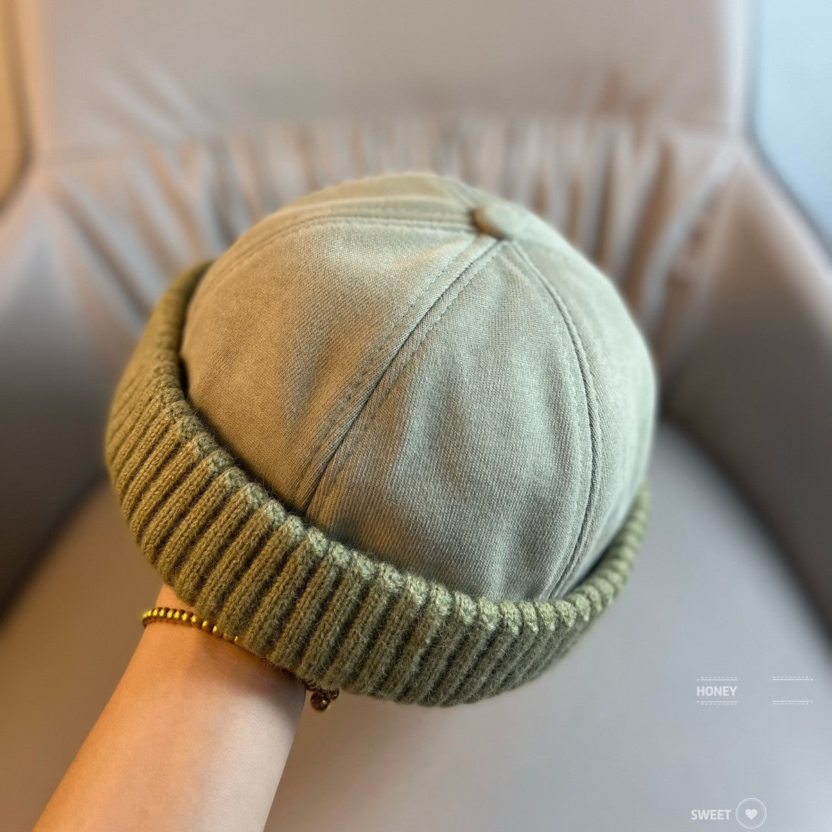 Tangerine brimless dome beanie with a ribbed knit cuff