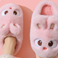 Pink cartoon bunny plush slippers seen from above on a foot, standard style, option photo for size 35/36