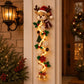 Reindeer Christmas door hanger with glowing spiral lights, snowflakes and bells on a porch pillar