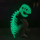 Person crouching in the dark in a glowing green dinosaur skeleton costume with skull and long tail