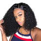 Woman wearing a short curly black synthetic lace front bob wig, angled view