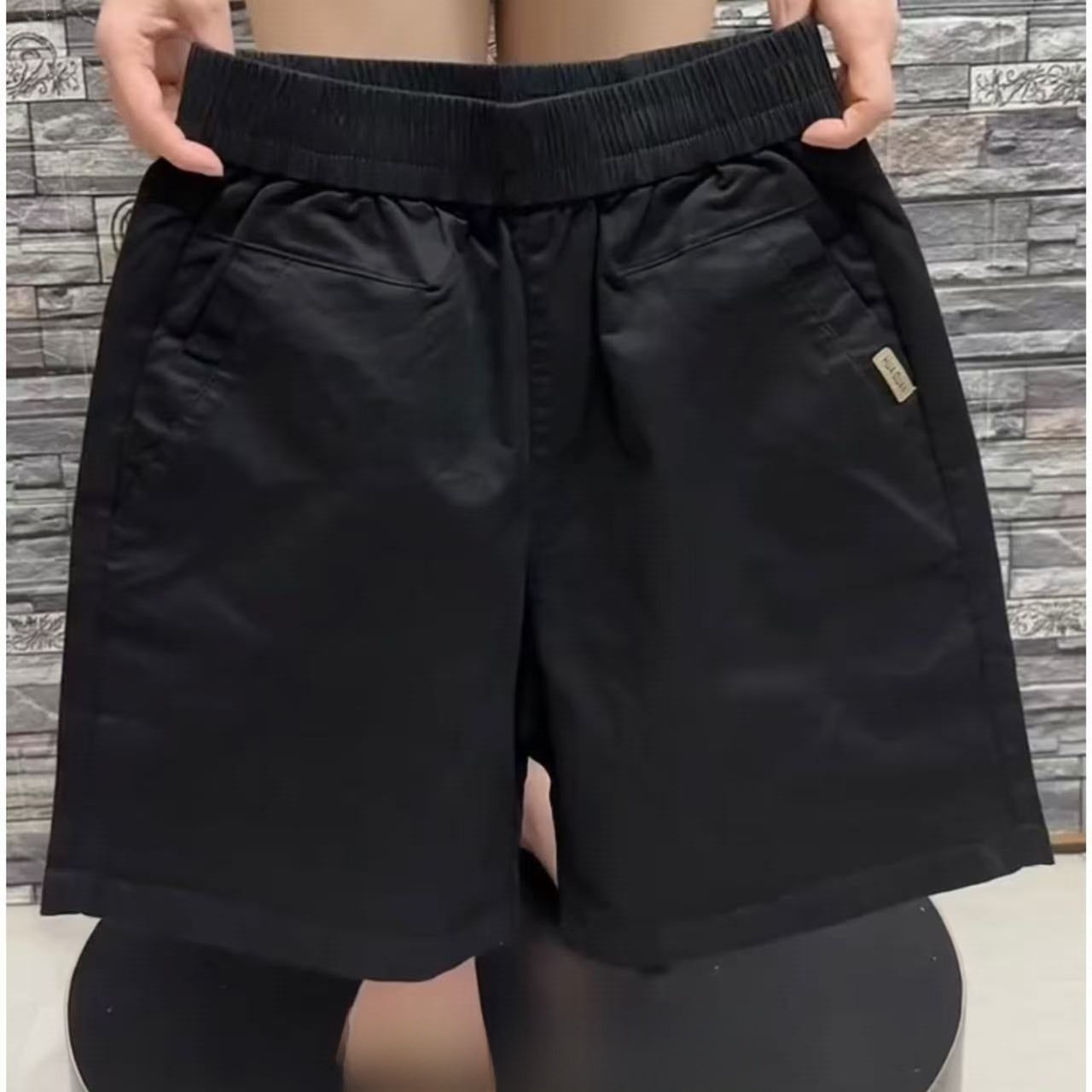 Burgundy high waisted loose wide leg shorts front view with pockets