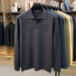 Dark Gray long sleeve knit polo shirt with three button placket and ribbed hem, size XL