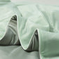 Box quilted summer coverlet from the eight colour range, large square stitching across the panel