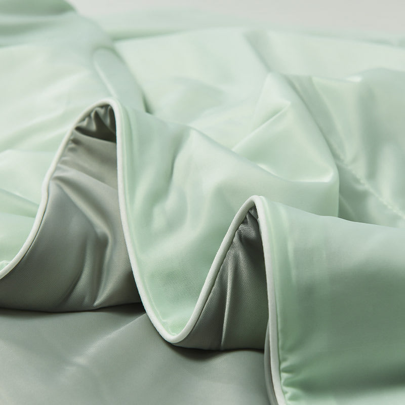 Box quilted summer coverlet from the eight colour range, large square stitching across the panel