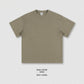 Heavyweight cotton oversized crew neck short sleeve tee in a solid color on a plain background