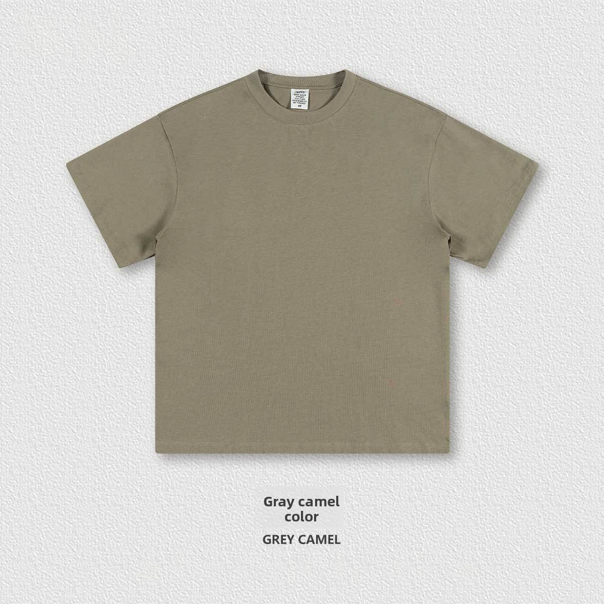 Heavyweight cotton oversized crew neck short sleeve tee in a solid color on a plain background