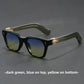 Set of square sunglasses in several frame and lens colours on a neutral backdrop