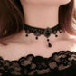 Vintage lace choker necklace displayed on a neck form against a plain backdrop