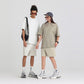 Flat lay of the heavyweight 305g cotton crew neck tee showing the boxy oversized cut and ribbed collar