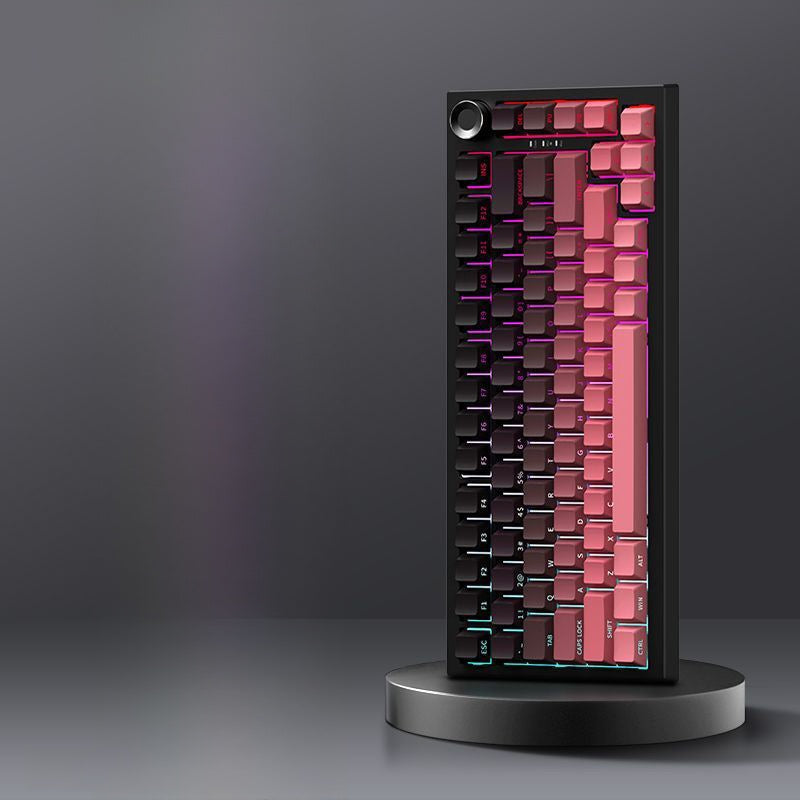 Blackberry Pink option, black keyboard with black to pink gradient keycaps and purple backlight on a stand