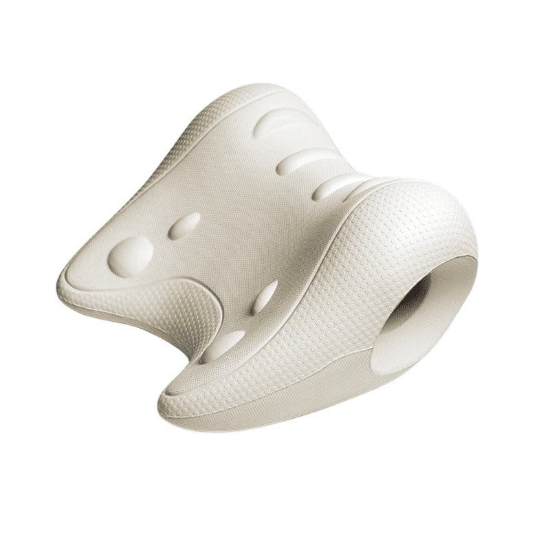 Off white moulded EVA neck rest with raised bumps and an oval opening in one wing