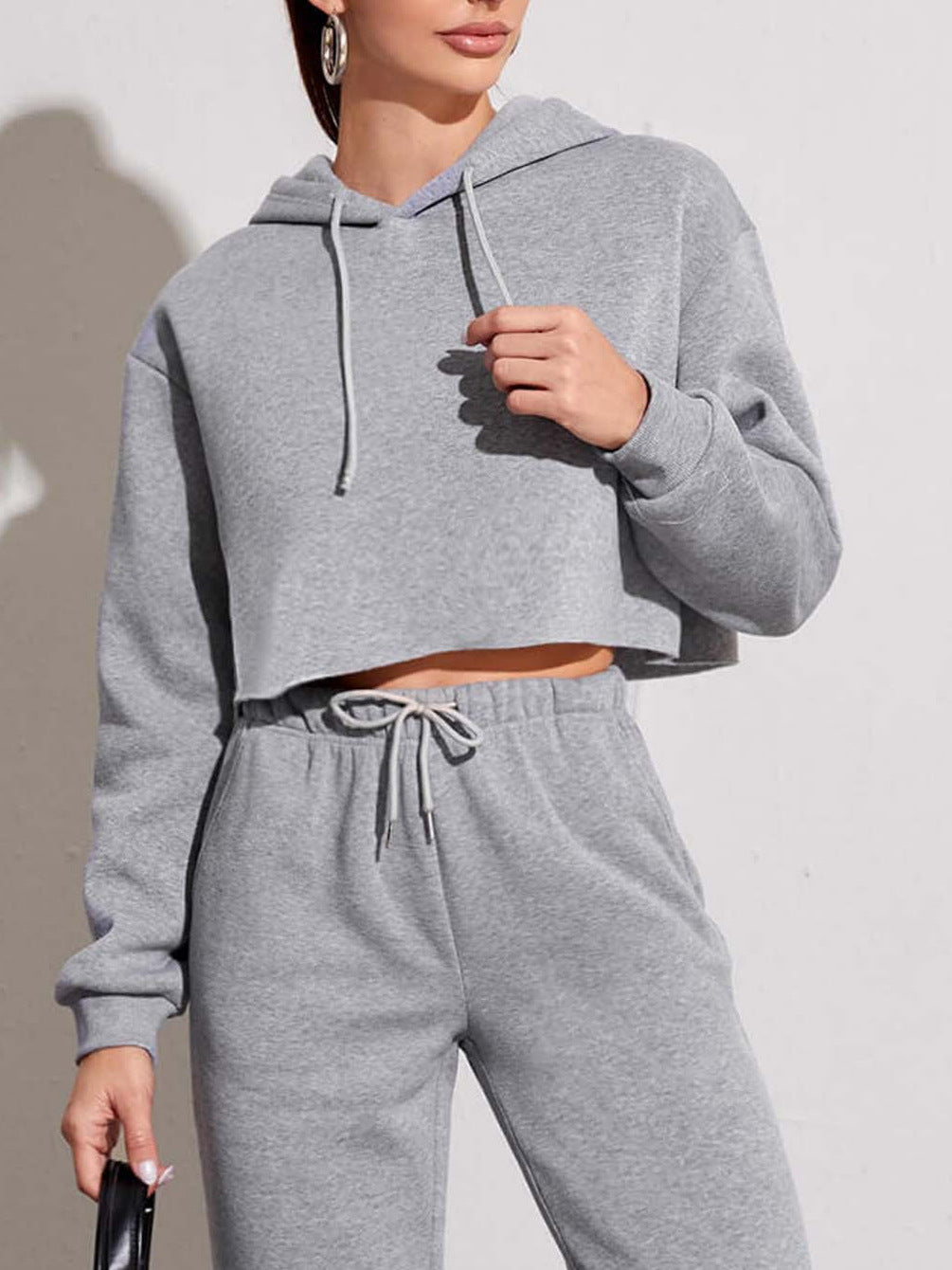 Side angle of the cropped hoodie and tapered jogger lounge set