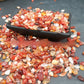 Red and amber carnelian look agate pebbles for tabletop and vase decor