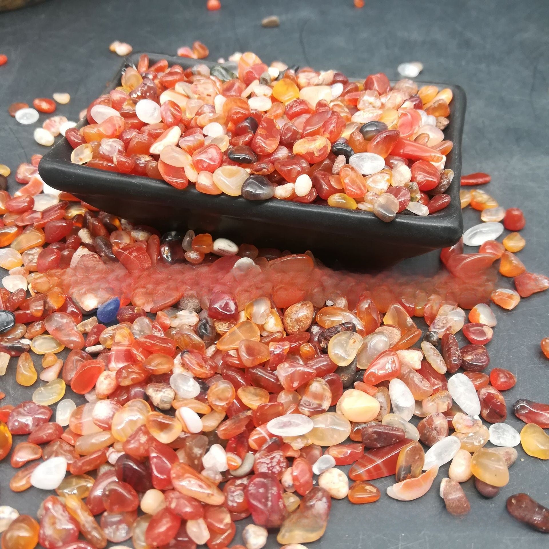 Red and amber carnelian look agate pebbles for tabletop and vase decor
