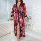 Secondary close up of the satin trim and tie belt on the floral kimono robe